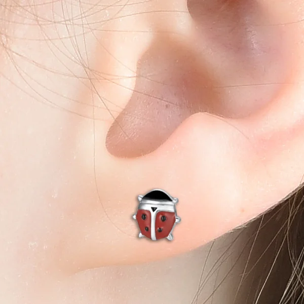Orecchini bambina in acciaio con coccinelle